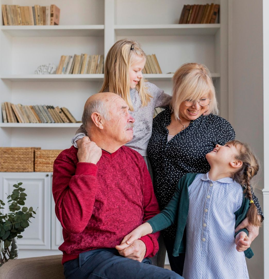 Old man with daughter and grandchildren